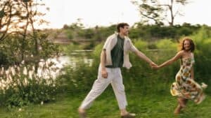 couple walking catching hand